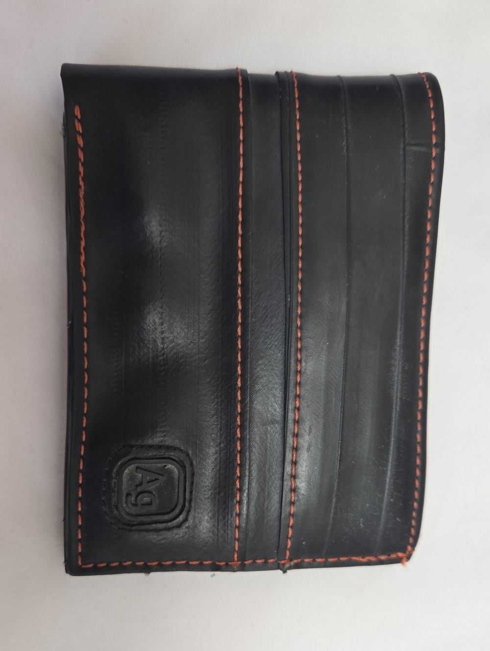 Black Upcycled Rubber Wallet with Orange Stitching